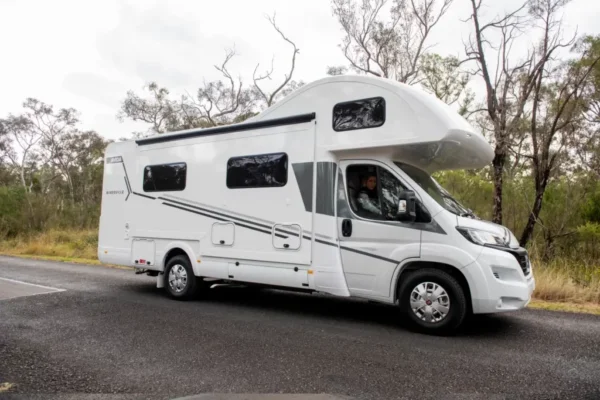 Avida Silverton motorhome parked on a road, showcasing its sleek design, spacious exterior, and practical features for outdoor living.