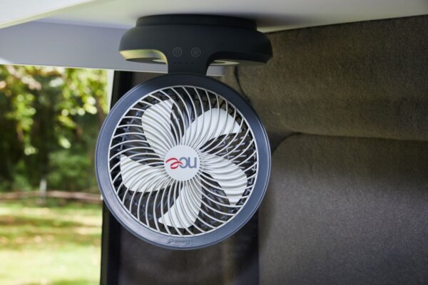 Compact ceiling fan in Avida Trek campervan interior, enhancing comfort for travelers with solar-powered convenience.