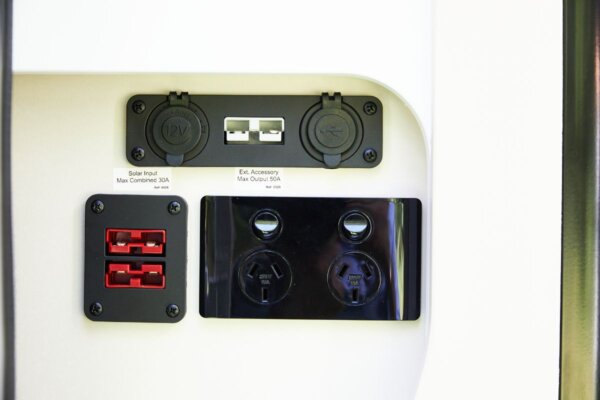 Solar input and accessory connection ports on Avida Trek campervan, featuring dual USB ports, 12V connections, and accessory output specifications.
